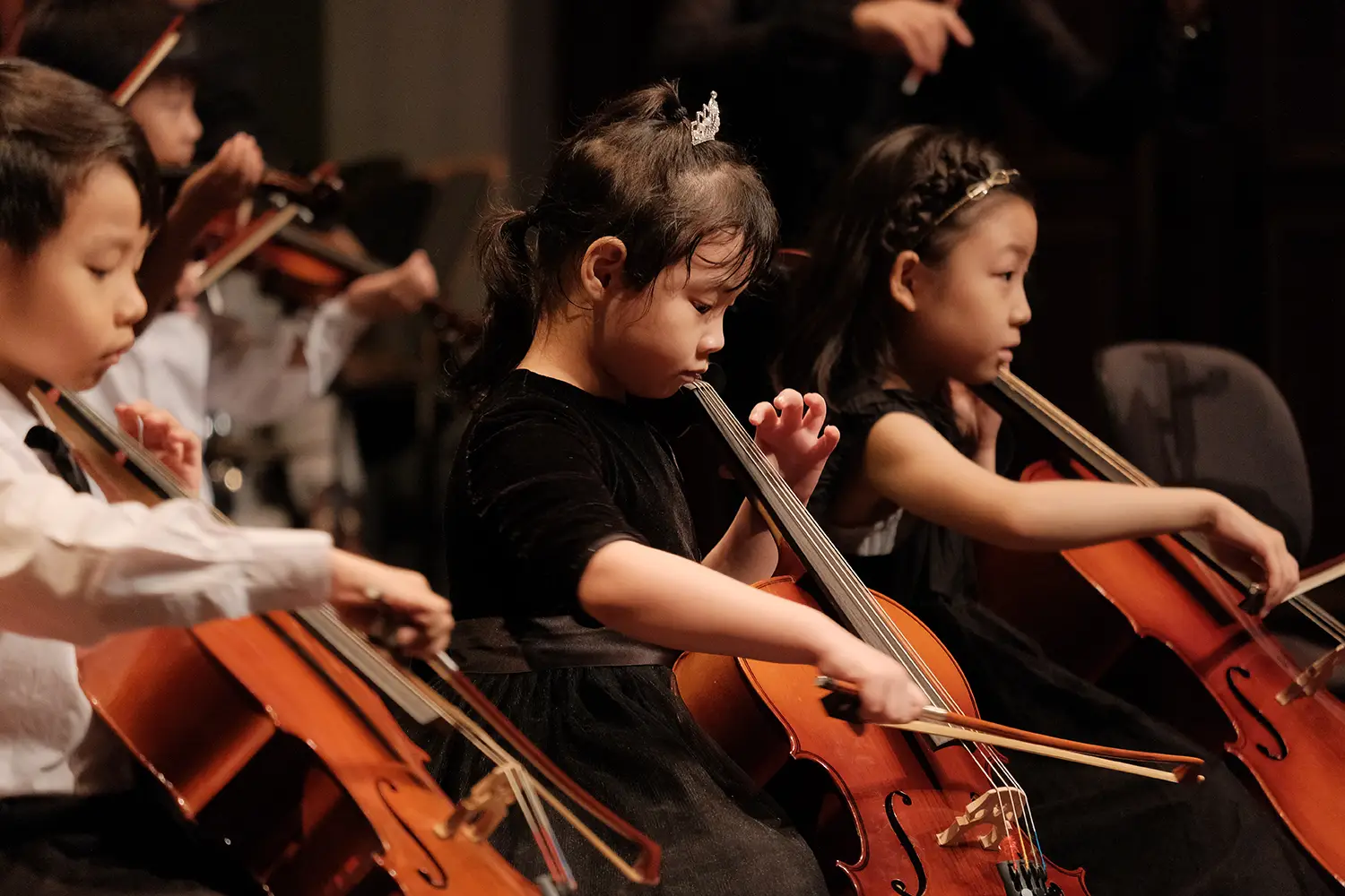 very young children playing cello